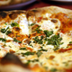 Illustration for article titled One graph explaining why you should always order a larger pizza